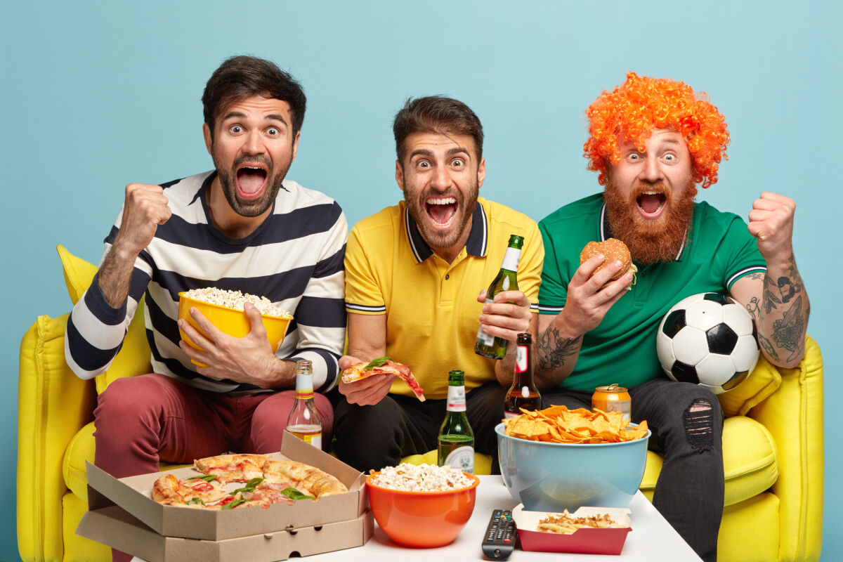Friends enjoying football predictions together